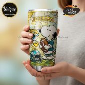 Jacksonville Jaguars Snoopy tumbler. Show your team pride with this premium stainless steel tumbler featuring Snoopy.