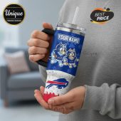 Buffalo Bills tumbler with cartoon dogs in uniform and custom name.!