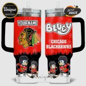 Tumbler with Chicago Blackhawks logos, 'YOUR NAME' text, and cartoon dog characters in hockey gear on a red background.!