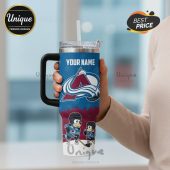 Customizable stainless steel tumbler featuring the Colorado Avalanche logo and cartoon dogs playing hockey.!