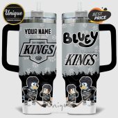 Customizable mug features cartoon dogs playing hockey with a Los Angeles Kings theme and space for a name.!