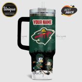 Green tumbler with Minnesota Wild logo, dog cartoon players, and customizable name.!