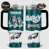 Personalized Bluey Philadelphia Eagles tumbler with Bluey and Bingo wearing Eagles football gear.!
