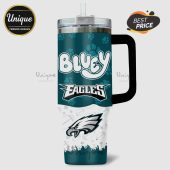 Tumbler with Bluey and Eagles text, paw prints, footballs, stars, and Eagles mascot design.!