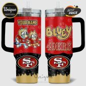 Customizable tumbler featuring cartoon dogs in 49ers uniforms. Text: 'YOUR NAME,' 'Bluey,' and '49ERS.'!