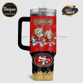 Tumbler featuring cartoon dogs in 49ers gear with the team logo and customizable name.!