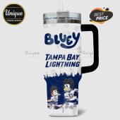 White tumbler with Bluey and Bingo playing ice hockey, Tampa Bay Lightning design.!