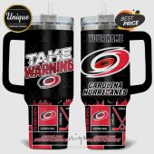 Carolina Hurricanes mug featuring team logos and the phrase 'Take Warning'.!