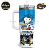 Carolina Panthers Snoopy tumbler. Personalized 40oz stainless steel cup featuring Snoopy and roses.