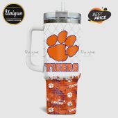 White stainless steel tumbler with handle featuring a Tigers paw print and 'TIGERS' text.!