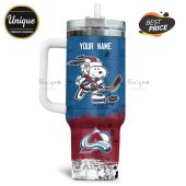 Tumbler features Snoopy playing hockey, the Colorado Avalanche logo, and the text 'Your Name'.!