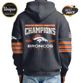 Back of a hoodie with the Denver Broncos logo, 'Champions,' and '2025-2026' text.!