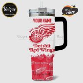 White tumbler featuring the Detroit Red Wings logo and customizable name text.!