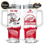 Personalized Detroit Red Wings Snoopy Stanley Tumbler. Hockeytown design with your name. Keeps drinks hot or cold.