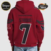 Back view of a red hoodie with 'HOUSTON' and 'Stroud 7' printed, featuring team logos on the sleeves.!