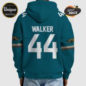 A teal hoodie featuring 'Walker' and '44' on the back, with jaguar logos on the sleeves.!