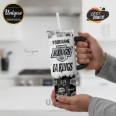 Personalized LA Kings stainless steel tumbler with handle and straw showing team logos and hockey sticks design.!