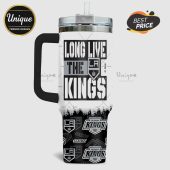 White tumbler with handle featuring a Los Angeles Kings hockey design.!