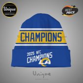 Blue beanie with 'Champions' in yellow and white stripes. Below reads '2025 NFC Champions' with the LA Rams logo.!