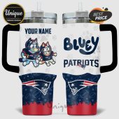 Two-sided tumbler featuring Bluey and Bingo as New England Patriots players with customizable name.!