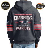 Back of a gray waffle hoodie with 'AMERICAN FOOTBALL CONFERENCE CHAMPIONS 2025-2026 NEW ENGLAND PATRIOTS' text and logo.!