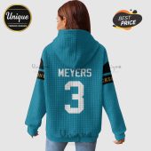 Back of a teal hoodie with 'MEYERS' and the number '3' printed in white, accented with black and gold stripes.!