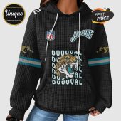 Black hoodie featuring the Jacksonville Jaguars logo, DUUUVAL text, and team colors.!