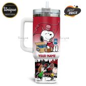 White tumbler shows Snoopy with Tampa Bay Buccaneers theme, Bud Light, and custom name.!