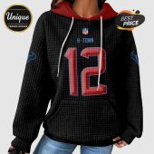 Black hooded sweatshirt with 'NFL', 'H-Town', and the number '12' in red and blue, plus Houston Texans logos on the sleeves.!