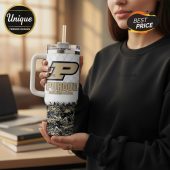 Purdue University stainless steel tumbler with straw and handle, featuring gold logo and 'Boilermakers' text.!