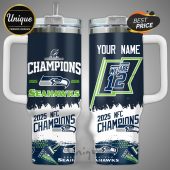 Tumbler features 'Champions 2025-2026' and 'We are 12' design with Seahawks logo and customizable name.!