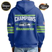 Back of blue waffle-textured hoodie with 'National Football Conference Champions, 2025 2026, Seahawks' text and logo.!