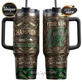 Two-sided design with 'Champions,' Seahawks logo, customizable name, and 'We are 12' on a tumbler.!