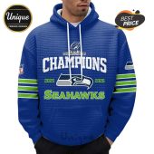 Blue hoodie with 'Champions' and Seahawks logo, text 2025, 2026, with green stripes on the sleeve!