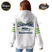 White hoodie featuring 'National Conference Champions 2025-2026' text, Seahawks logo, and green stripes on the sleeves.!