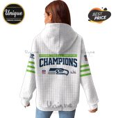 White hoodie with Seattle Seahawks logo and 'National Football Conference Champions' text on the back.!