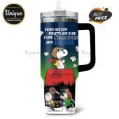 Tumbler with Snoopy, Woodstock, and Peanuts characters over Seahawks logos. Text: Roses are red, I love Seahawks and Bud Light.!