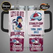 Tumbler featuring Snoopy & Charlie Brown with Colorado Avalanche logos, text 'Let's Go Avs!', 'Stanley Cup Champions', and years '1996, 2001, 2022'.!