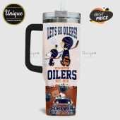 Tumbler featuring Snoopy & Charlie Brown themed for the Edmonton Oilers hockey team with 'Let's Go Oilers!' text.!