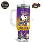 Tumbler with Snoopy, football, and beer design for Minnesota Vikings fans; customizable with your name.!