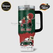 Tumbler with Snoopy and Charlie Brown as hockey players and Minnesota Wild logos!