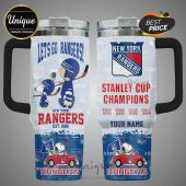 Two-sided tumbler with New York Rangers and Peanuts cartoon design. Features team logo, Snoopy, Charlie Brown, and Stanley Cup years.!