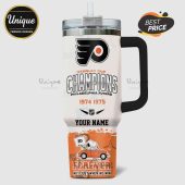 White tumbler with handle shows the Philadelphia Flyers Stanley Cup Champions design, Snoopy in a car, and space for your name.!
