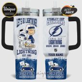 Tampa Bay Lightning tumbler featuring Snoopy, Charlie Brown, team logos, and Stanley Cup wins!