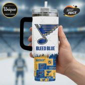 White travel mug featuring the St. Louis Blues logo and the phrase 
