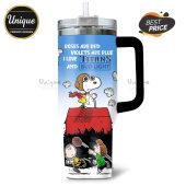 Tumbler featuring Snoopy on his doghouse, Charlie Brown and friends, with text: Roses are red, violets are blue, I love Titans.!