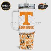 White travel mug with Tennessee Volunteers college sports design featuring the letter T and team logos.!