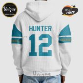 Back of a white hoodie with blue accents, 'HUNTER' and the number '12' printed on it.!