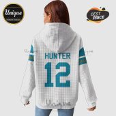 Back of white hoodie with 'HUNTER' and the number '12' in teal. Blue and gold stripe detail on sleeves.!