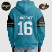 The back of a teal hoodie with 'LAWRENCE' and '16' in white, plus 'JACKSONVILLE' on the sleeves.!